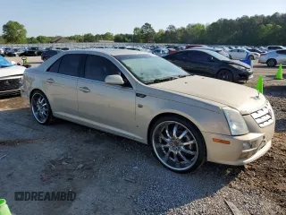 2007 Cadillac STS z VIN 1G6DW677970151227, wystawiony jako Copart lot #52345265 z przebiegiem 154 790 mil mil oraz Szkoda całkowita • Salvage title. Historia ofert i sprzedaży dostępna na DreamBid. Obrazek 4.