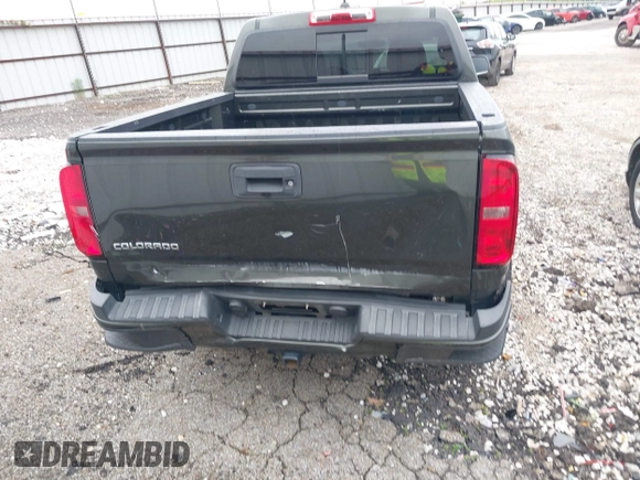 2018 Chevrolet Colorado 4WD LT z VIN 1GCGTCEN2J1235085, wystawiony jako IAAI lot #42192629 z przebiegiem 83 914 mil mil oraz . Historia ofert i sprzedaży dostępna na DreamBid. Obrazek 16.