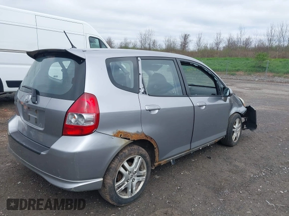2007 Honda Fit Sport z VIN JHMGD38687S017199, wystawiony jako IAAI lot #42156912 z przebiegiem 194 685 mil mil oraz . Historia ofert i sprzedaży dostępna na DreamBid. Obrazek 4.