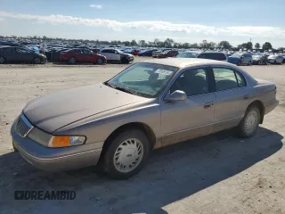 1995 Lincoln Continental with VIN 1LNLM97V8SY681113, listed as a Copart auction lot 73695134 with 176,175 mi miles and Salvage Title. Bid and sale history available at carsss.com. Image 1.
