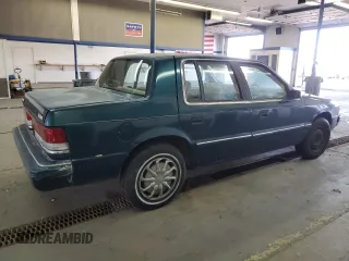 1994 Plymouth Acclaim z VIN 3P3AA46K7RT276936, wystawiony jako Copart lot #49509835 z przebiegiem 176 324 mil mil oraz Tytuł czysty. Historia ofert i sprzedaży dostępna na DreamBid. Obrazek 3.