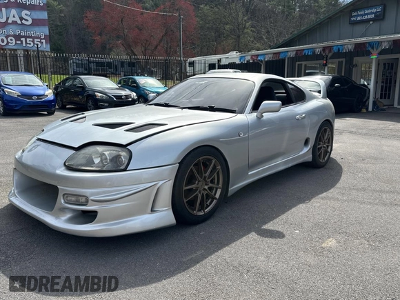 1993 Toyota Supra с VIN JZA800010229, выставлен на аукционе Copart как лот 50000065 с пробегом 130 612 миль миль и Чистый • Clean title. История ставок и продаж доступна на DreamBid. Изображение 2.