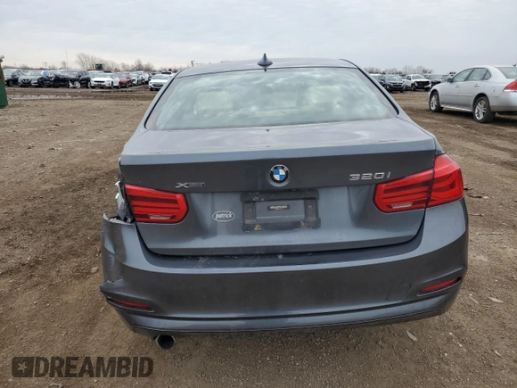 2018 BMW 3 Series 320i xDrive z VIN WBA8A3C57JA491717, wystawiony jako Copart lot #49509515 z przebiegiem 57 141 mil mil oraz Szkoda całkowita • Salvage title. Historia ofert i sprzedaży dostępna na DreamBid. Obrazek 6.
