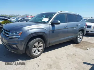 2018 Volkswagen Atlas SE with VIN 1V2CR2CA2JC576397, listed as a IAAI auction lot 41959708 with 168,619 mi miles and . Bid and sale history available at DreamBid. Image 2.