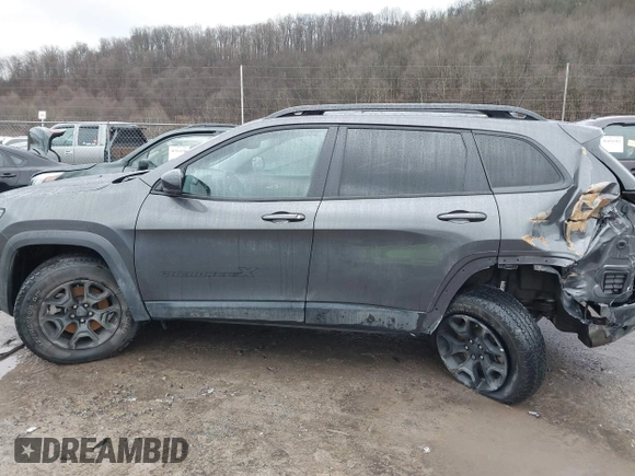 2022 Jeep Cherokee X with VIN 1C4PJMCX4ND525297, listed as a IAAI auction lot 41519912 with 42,691 mi miles. Bid and sale history available at carsss.com. Image 14.