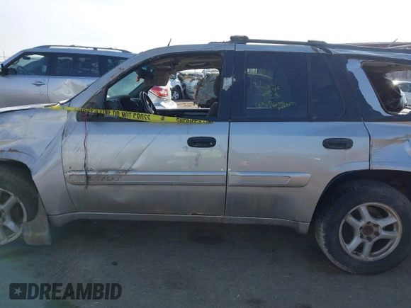 2004 GMC Envoy SLT with VIN 1GKDT13S742133932, listed as a IAAI auction lot 41598339 with 168,651 mi miles and . Bid and sale history available at DreamBid. Image 14.