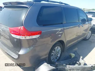 2014 Toyota Sienna XLE with VIN 5TDYK3DC4ES419928, listed as a IAAI auction lot 41976538 with 144,405 mi miles. Bid and sale history available at carsss.com. Image 3.
