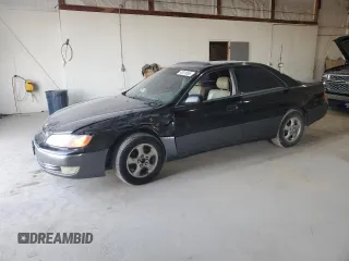 1997 Lexus ES 300 Luxury Sport Sdn with VIN JT8BF22G3V5008101, listed as a Copart auction lot 48319565 with 247,499 mi miles and Salvage Title. Bid and sale history available at carsss.com. Image 1.