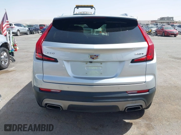 2021 Cadillac XT4 FWD Premium Luxury with VIN 1GYFZCR42MF005253, listed as a IAAI auction lot 40470700 with 70,571 mi miles and . Bid and sale history available at carsss.com. Image 16.