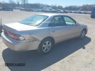 1998 Lexus ES 300 with VIN JT8BF28G6W5042042, listed as a IAAI auction lot 42000714 with 115,279 mi miles and . Bid and sale history available at DreamBid. Image 4.