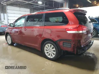 2014 Toyota Sienna LE with VIN 5TDJK3DC9ES083307, listed as a Copart auction lot 57939385 with 132,494 mi miles and Salvage title. Bid and sale history available at DreamBid. Image 2.