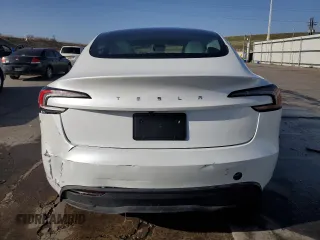 2025 Tesla Model 3 Long Range with VIN 5YJ3E1EAXSF935004, listed as a Copart auction lot 52233195 with 5,873 mi miles and Salvage Title. Bid and sale history available at carsss.com. Image 6.