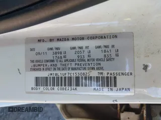 2012 Mazda 3 i Sport with VIN JM1BL1UF7C1530825, listed as a IAAI auction lot 42092415 with 133,516 mi miles and . Bid and sale history available at DreamBid. Image 9.