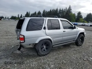 2003 Nissan Pathfinder LE z VIN JN8DR09Y73W801482, wystawiony jako Copart lot #56216005 z przebiegiem 238 781 mil mil oraz Szkoda całkowita • Salvage title. Historia ofert i sprzedaży dostępna na DreamBid. Obrazek 3.