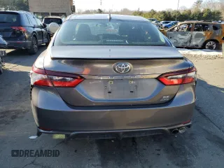 2023 Toyota Camry SE z VIN 4T1G11BK7PU091735, wystawiony jako Copart lot #44305035 z przebiegiem 66 498 mil mil oraz Szkoda całkowita • Salvage title. Historia ofert i sprzedaży dostępna na DreamBid. Obrazek 6.