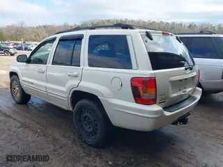 2003 Jeep Grand Cherokee Limited with VIN 1J4GW58N63C505919, listed as a IAAI auction lot 41566997 with 233,827 mi miles. Bid and sale history available at carsss.com. Image 3.