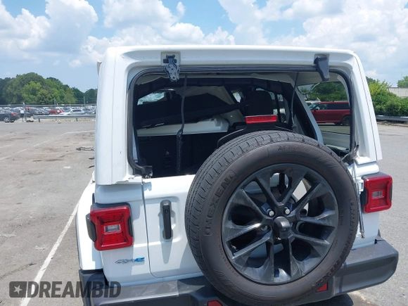 2024 Jeep Wrangler Sahara with VIN 1C4RJXP64RW270463, listed as a IAAI auction lot 42598295 with 36,251 mi miles and . Bid and sale history available at DreamBid. Image 19.