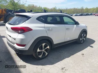 2016 Hyundai Tucson Eco with VIN KM8J3CA22GU076489, listed as a IAAI auction lot 42169732 with 153,597 mi miles. Bid and sale history available at carsss.com. Image 4.