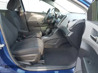 2013 Chevrolet Sonic LT with VIN 1G1JC5SB2D4147595, listed as a IAAI auction lot 41643641 with 83,538 mi miles and . Bid and sale history available at DreamBid. Image 5.