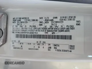 2013 Ford Escape SEL с VIN 1FMCU0H91DUB90163, выставлен на аукционе Copart как лот 64091785 с пробегом 156 038 миль миль и Списание • Salvage title. История ставок и продаж доступна на DreamBid. Изображение 13.