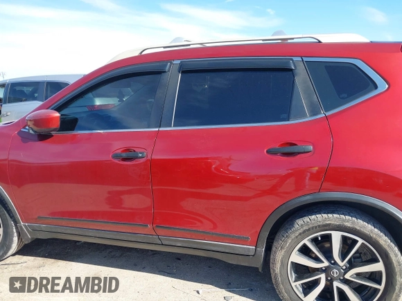 2016 Nissan Rogue S with VIN KNMAT2MT0GP629321, listed as a IAAI auction lot 41328586 with 192,994 mi miles and . Bid and sale history available at DreamBid. Image 14.