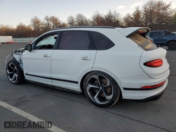 2022 Bentley Bentayga V8 z VIN SJAAM2ZV6NC039590, wystawiony jako Copart lot #85567404 z przebiegiem Nie podano mil oraz Szkoda całkowita • Salvage title. Historia ofert i sprzedaży dostępna na DreamBid. Obrazek 2.