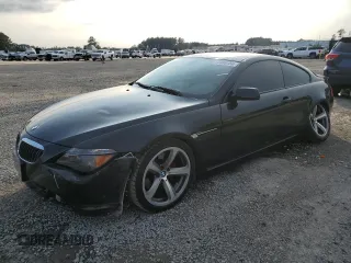 2007 BMW 6 Series 650i with VIN WBAEH13577CR52351, listed as a Copart auction lot 72886154 with 77,410 mi miles and Salvage Title. Bid and sale history available at carsss.com. Image 1.