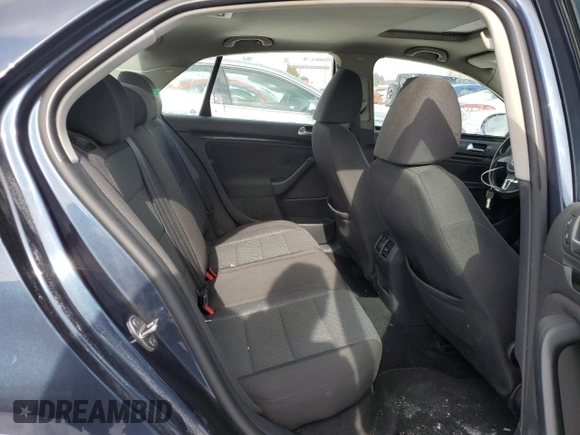 2010 Volkswagen Jetta z VIN 3VWHX7AJ3AM134849, wystawiony jako Copart lot #44730325 z przebiegiem 316 740 mil mil oraz Czysty tytuł • Clean title. Historia ofert i sprzedaży dostępna na DreamBid. Obrazek 10.
