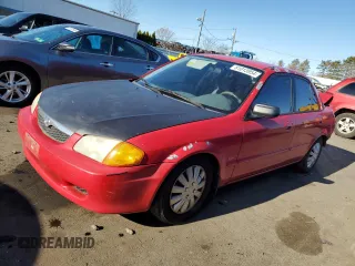 1999 Mazda Protege DX with VIN JM1BJ2223X0103746, listed as a Copart auction lot 81813954 with 172,082 mi miles and Salvage Title. Bid and sale history available at DreamBid. Image 1.