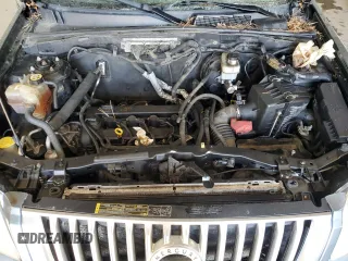 2010 Mercury Mariner Premier z VIN 4M2CN8H77AKJ24734, wystawiony jako Copart lot #54317785 z przebiegiem 206 212 mil mil oraz Szkoda całkowita • Salvage title. Historia ofert i sprzedaży dostępna na DreamBid. Obrazek 12.