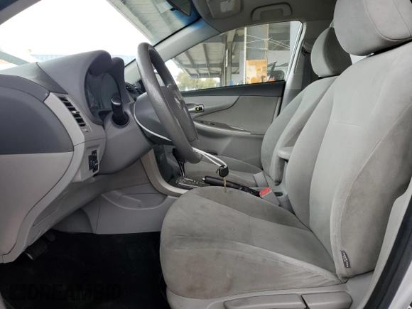 2010 Toyota Corolla with VIN 1NXBU4EE8AZ187793, listed as a Copart auction lot 63909235 with 65,164 mi miles and Salvage title. Bid and sale history available at DreamBid. Image 7.