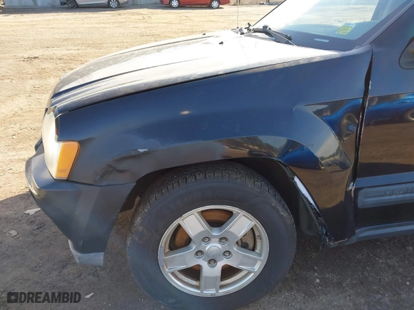 2006 Jeep Grand Cherokee Laredo with VIN 1J4GR48K16C142277, listed as a IAAI auction lot 41598878 with 169,236 mi miles. Bid and sale history available at carsss.com. Image 6.