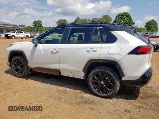 2023 Toyota RAV4 Hybrid XSE with VIN 2T3E6RFV5PW043640, listed as a Copart auction lot 64097125 with 13,686 mi miles and Salvage title. Bid and sale history available at DreamBid. Image 2.