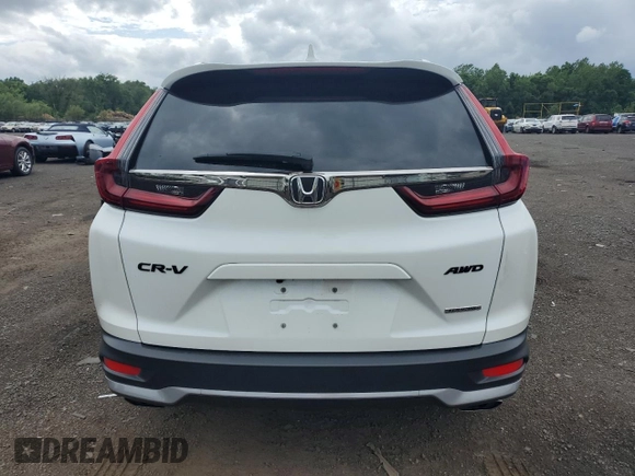 2020 Honda CR-V Touring z VIN 2HKRW2H90LH645727, wystawiony jako Copart lot #62077365 z przebiegiem 58 614 mil mil oraz Szkoda całkowita • Salvage title. Historia ofert i sprzedaży dostępna na DreamBid. Obrazek 6.
