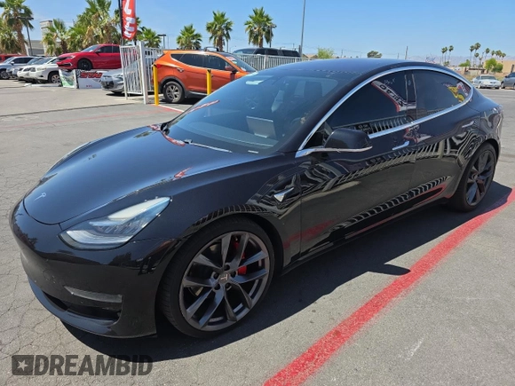 2018 Tesla Model 3 Long Range Battery z VIN 5YJ3E1EB8JF070461, wystawiony jako Copart lot #58379905 z przebiegiem 49 178 mil mil oraz Tytuł czysty. Historia ofert i sprzedaży dostępna na DreamBid. Obrazek 2.
