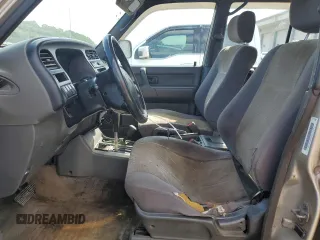 1999 Isuzu Trooper S with VIN JACDJ58X6X7924973, listed as a Copart auction lot 57881235 with 269,301 mi miles and Salvage title. Bid and sale history available at DreamBid. Image 7.