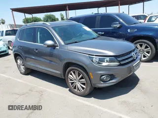 2013 Volkswagen Tiguan SE z VIN WVGAV7AX0DW536648, wystawiony jako IAAI lot #42416603 z przebiegiem 211 282 mil mil oraz . Historia ofert i sprzedaży dostępna na DreamBid. Obrazek 1.