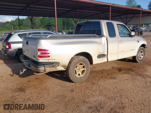 1998 Ford F-150 XL with VIN 1FTRX07L1WKA76665, listed as a IAAI auction lot 41863626 with 30,654 mi miles. Bid and sale history available at carsss.com. Image 4.