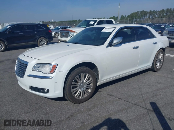 2013 Chrysler 300 Luxury Series with VIN 2C3CCASGXDH573689, listed as a IAAI auction lot 41782712 with 204,746 mi miles and . Bid and sale history available at DreamBid. Image 18.