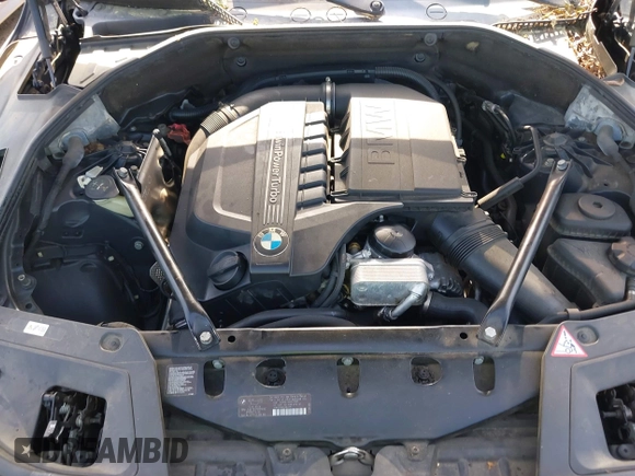 2013 BMW 5 Series GT 535i xDrive with VIN WBASP2C59DC339770, listed as a IAAI auction lot 42171135 with 106,625 mi miles. Bid and sale history available at carsss.com. Image 10.