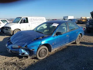 2002 Saturn SL z VIN 1G8ZF52802Z134506, wystawiony jako IAAI lot #41461865 z przebiegiem 210 886 mil mil oraz . Historia ofert i sprzedaży dostępna na DreamBid. Obrazek 2.