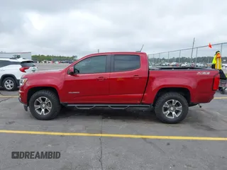 2020 Chevrolet Colorado 4WD Z71 with VIN 1GCGTDEN3L1132444, listed as a IAAI auction lot 41898911 with 65,493 mi miles and . Bid and sale history available at DreamBid. Image 14.