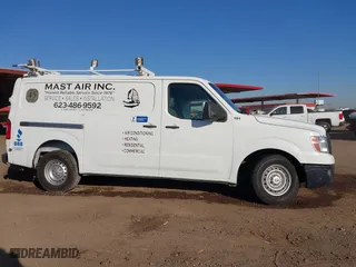 2016 Nissan NV SV with VIN 1N6BF0KM4GN812662, listed as a IAAI auction lot 42007066 with 143,856 mi miles. Bid and sale history available at carsss.com. Image 13.