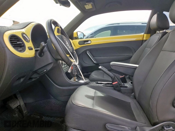 2014 Volkswagen Beetle 2.5L with VIN 3VWJX7AT2EM610372, listed as a Copart auction lot 60163345 with 121,497 mi miles and Salvage title. Bid and sale history available at DreamBid. Image 7.