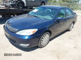 2003 Toyota Camry LE with VIN 4T1BE32K13U204938, listed as a IAAI auction lot 42194548 with 263,710 mi miles and . Bid and sale history available at DreamBid. Image 2.