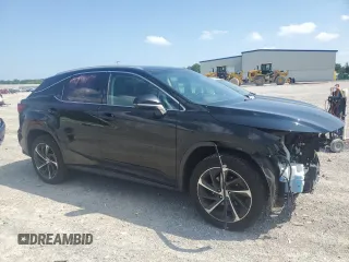 2016 Lexus RX 350 with VIN 2T2BZMCA9GC010001, listed as a Copart auction lot 66301085 with 116,091 mi miles and Salvage title. Bid and sale history available at DreamBid. Image 4.