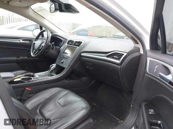 2013 Ford Fusion Titanium Hybrid with VIN 3FA6P0RU5DR357469, listed as a IAAI auction lot 41969315 with 215,732 mi miles. Bid and sale history available at carsss.com. Image 5.