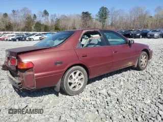 2000 Toyota Camry CE z VIN 4T1BG22K4YU645684, wystawiony jako Copart lot #50883715 z przebiegiem 263 664 mil mil oraz Szkoda całkowita • Salvage title. Historia ofert i sprzedaży dostępna na DreamBid. Obrazek 3.