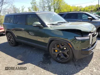 2022 Rivian R1S Launch Edition z VIN 7PDSGABLXNN002875, wystawiony jako Copart lot #55218465 z przebiegiem 25 988 mil mil oraz Szkody całkowita. Historia ofert i sprzedaży dostępna na DreamBid. Obrazek 4.