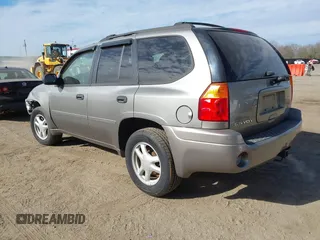 2008 GMC Envoy SLE2 with VIN 1GKDT13S782210241, listed as a IAAI auction lot 41635443 with 171,816 mi miles. Bid and sale history available at carsss.com. Image 3.